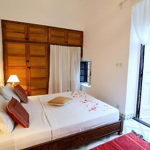 Kamer met een Queen Size Bed
